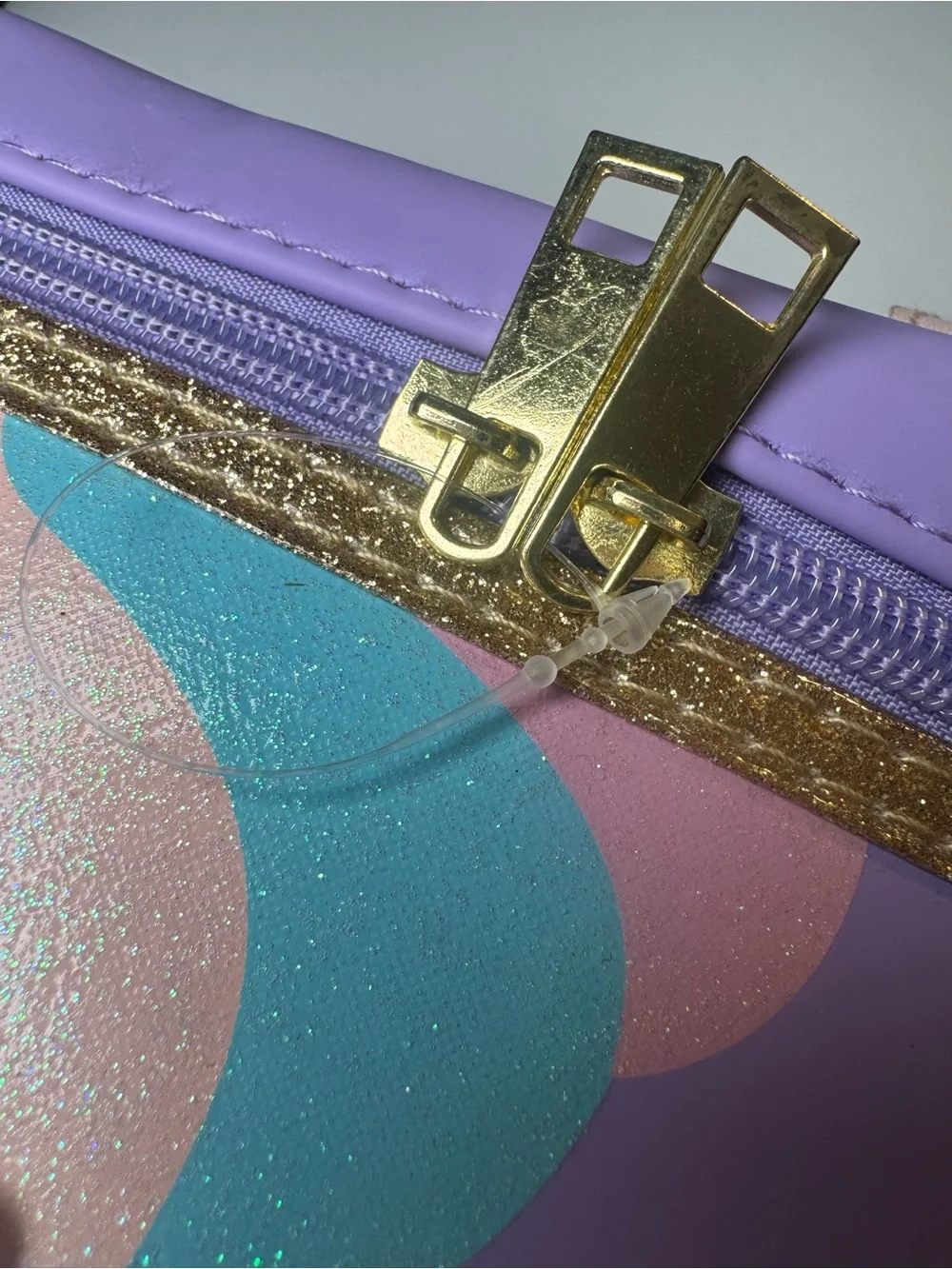 FAO Schwarz Mythical Unicorn Cosmetic Bag in Lavender with Gold Accents